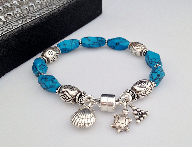 Sterling Silver and Blue Howlite Bracelet with Charms and Magnetic Clasp 6 1/2 inch - Zuzi's